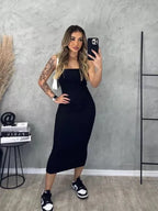 vestido midi canelado, vestido tomara que caia feminino, vestido feminino midi, vestido canelado midi, vestido básico feminino, vestido feminino moderno, vestido midi elegante, vestido midi casual, vestido midi verão, vestido canelado tomara que caia, vestido feminino cintura marcada, vestido feminino confortável